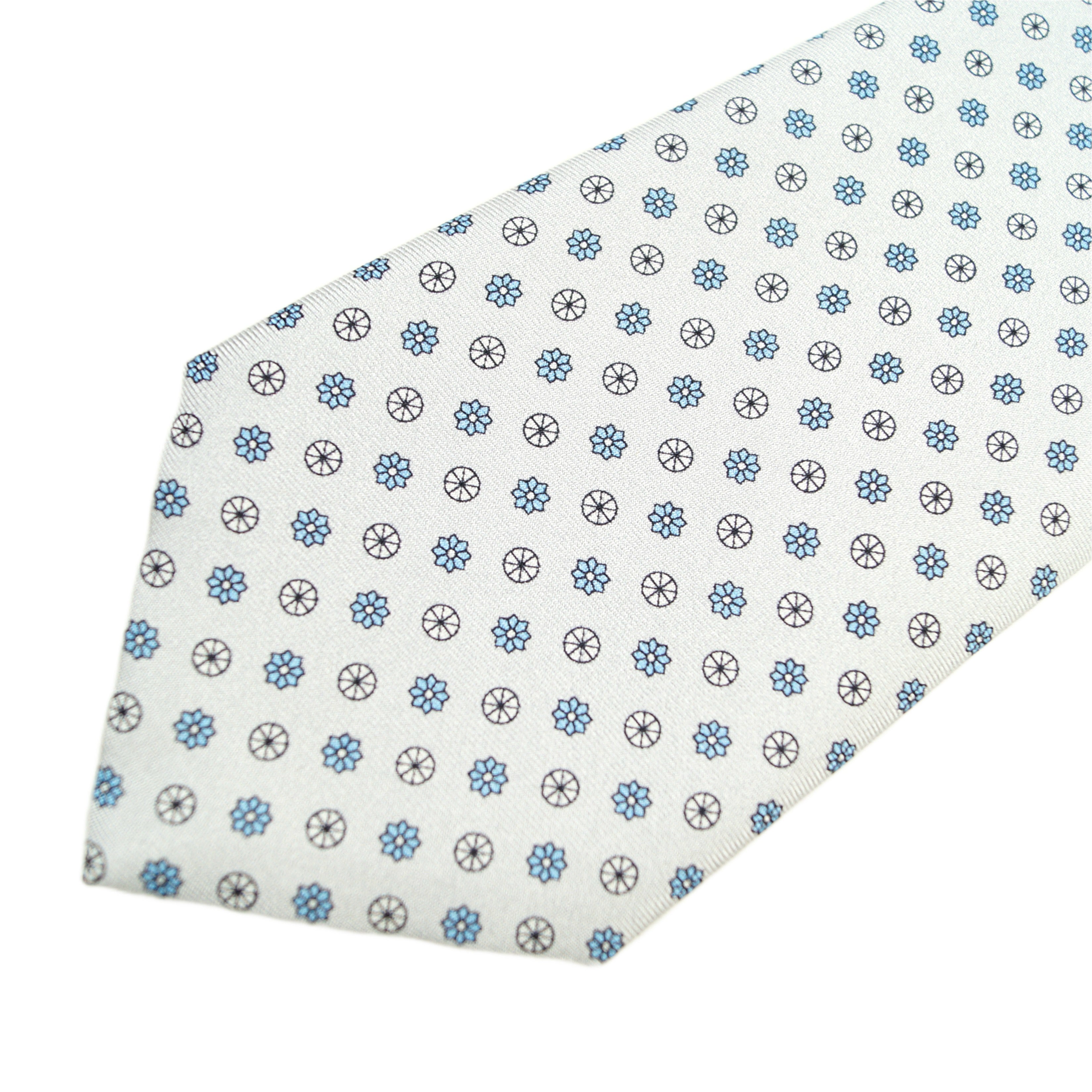 Ice white tie with small medallions in light blue