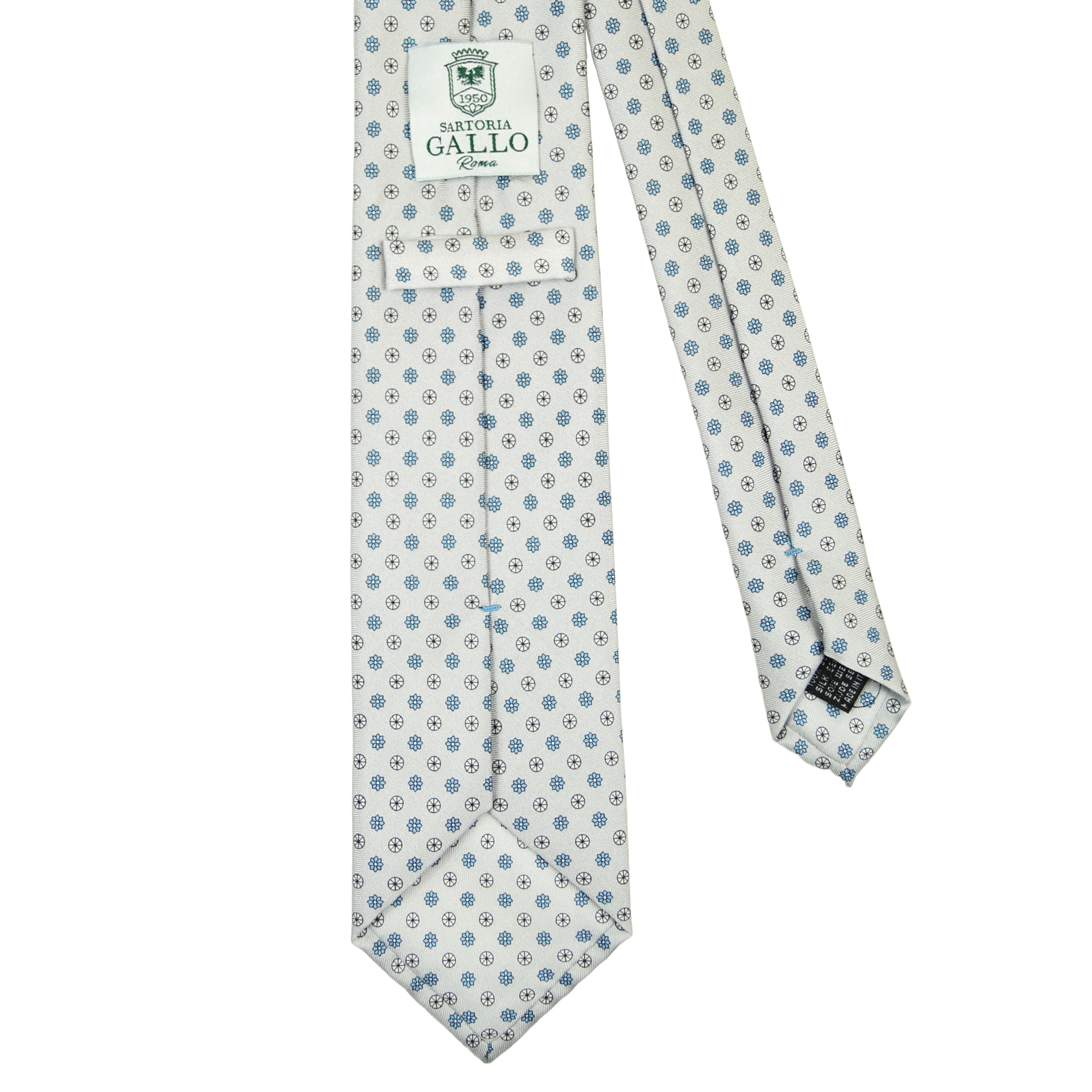 Ice white tie with small medallions in light blue